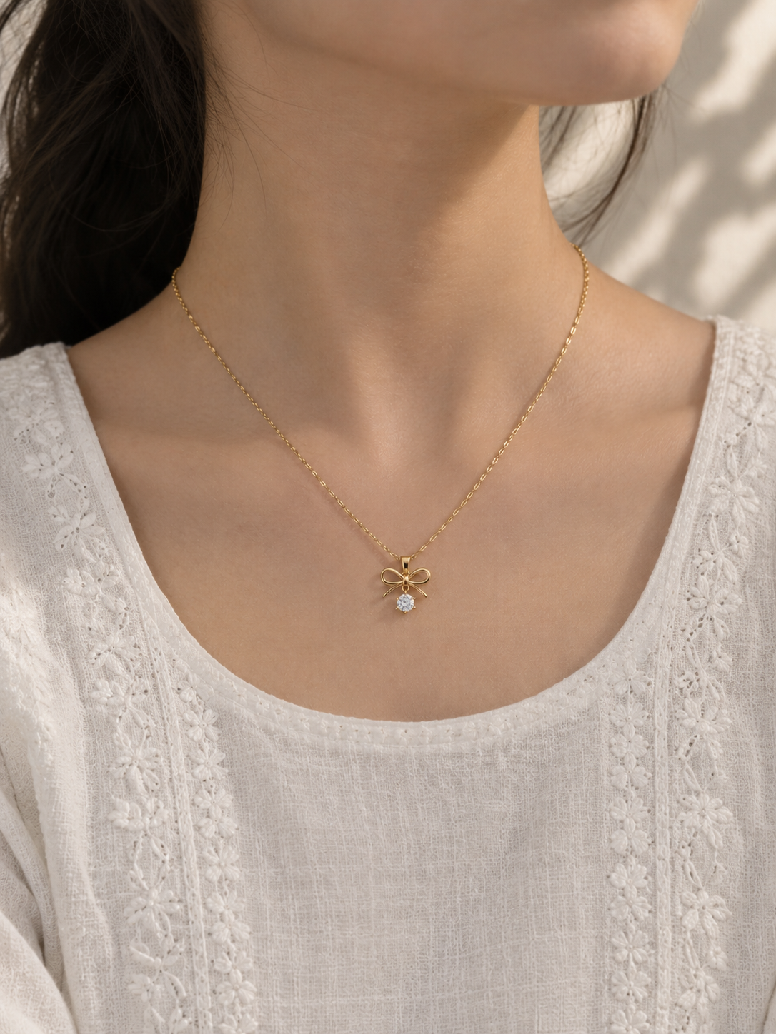 The Golden Bow Crystal Pendant Necklace